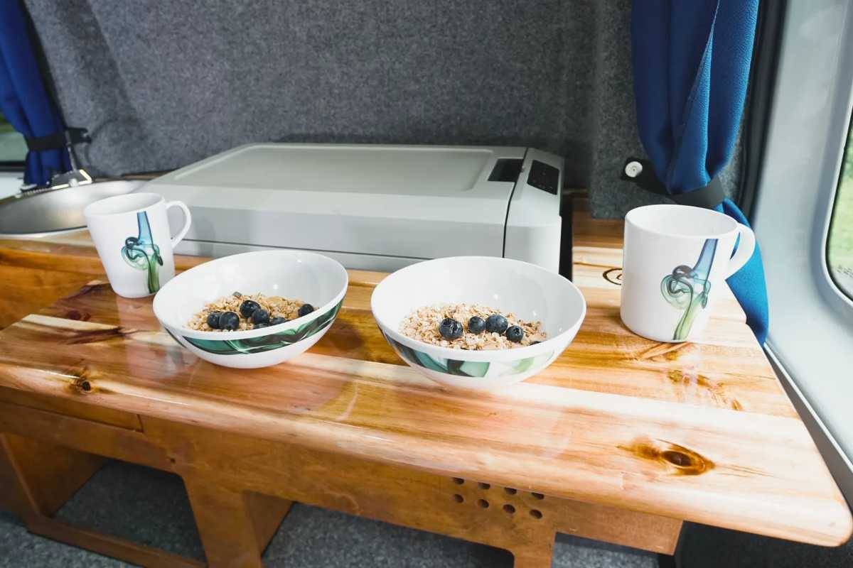 dishes on a table in a camper