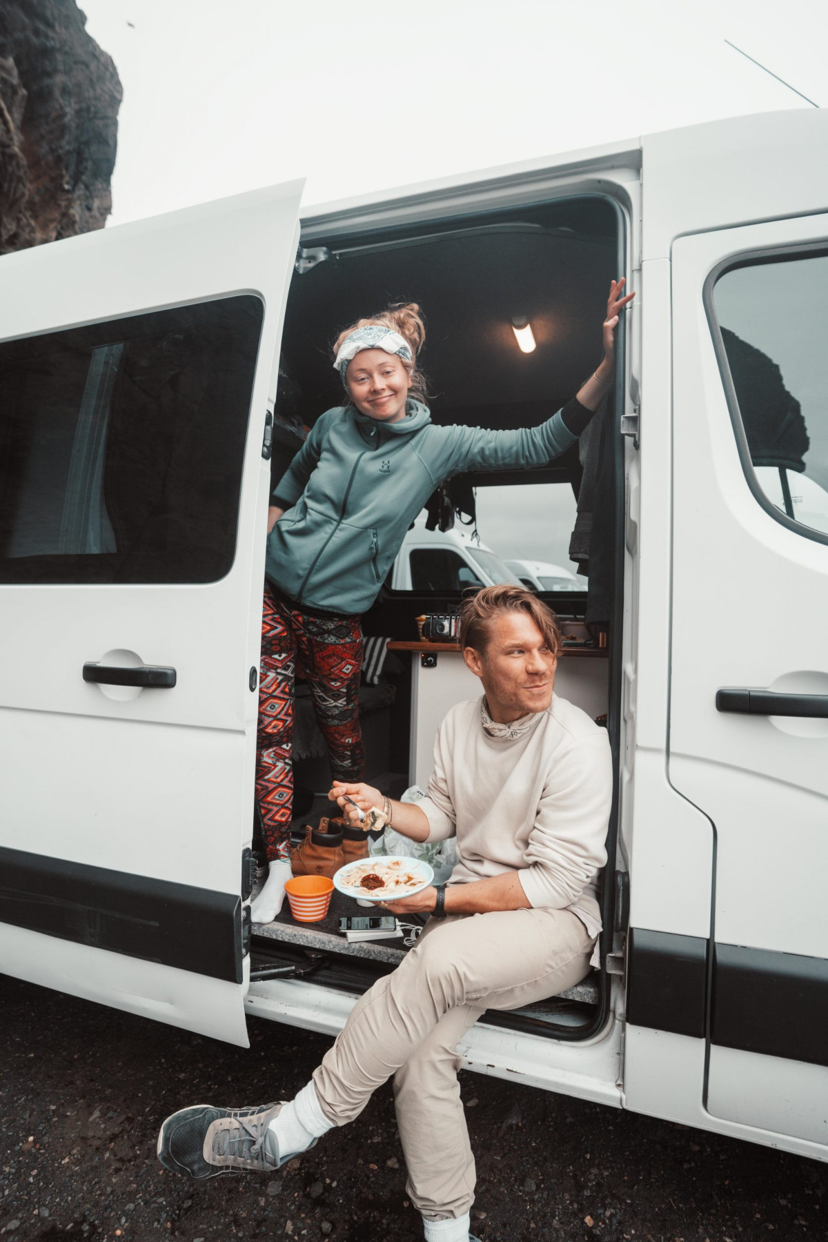 2 people inside a campervan