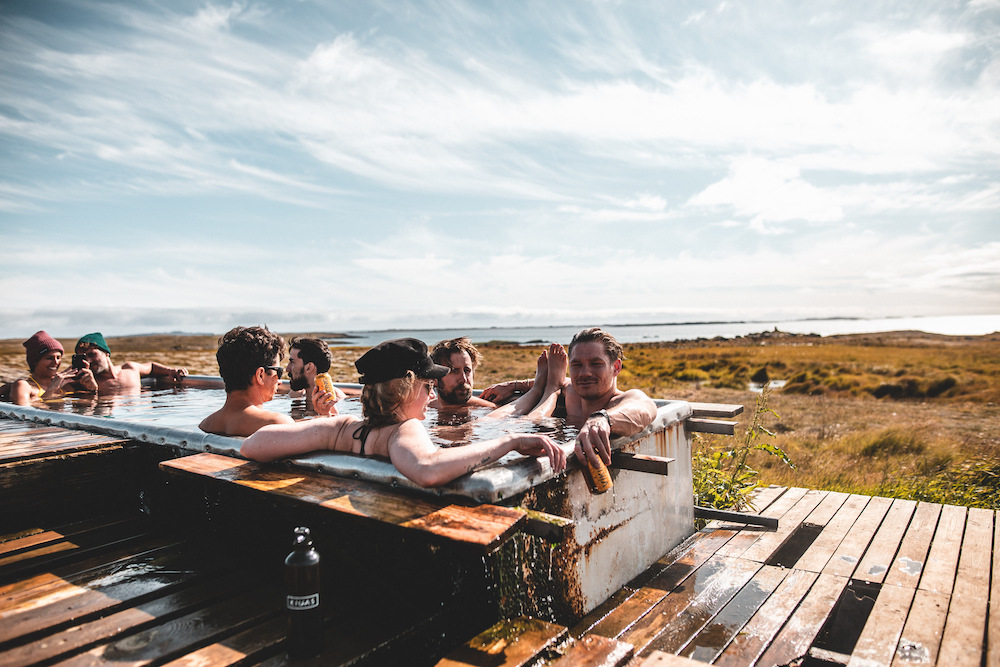 Group of people inside a big hot tube