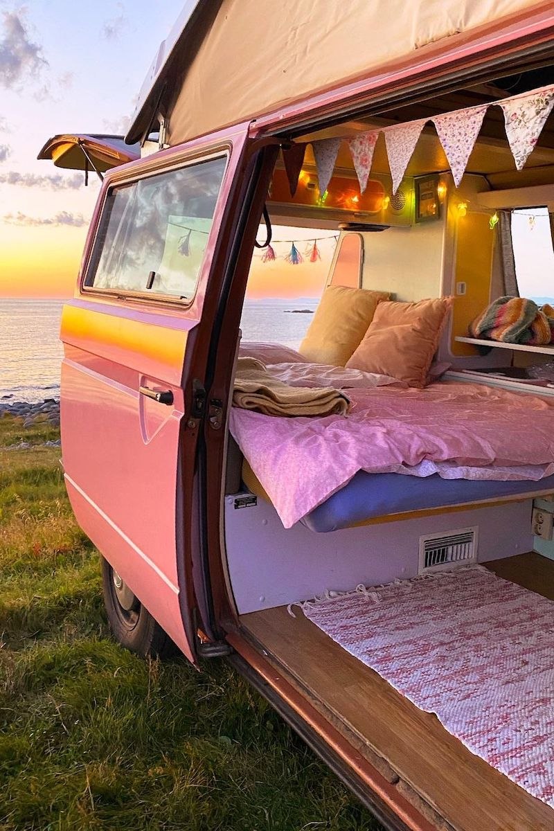 2 people inside a campervan