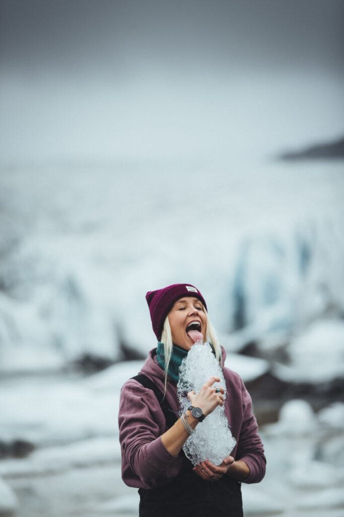 Girl licking iceberg