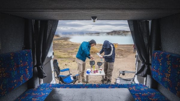 looking out the back of a camper in winter in iceland