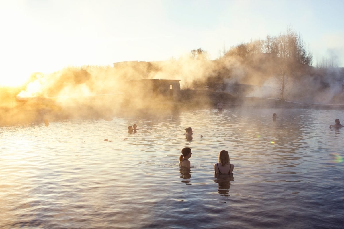 People in lesser known sightseeing Golden Circle Iceland Secret Lagoon
