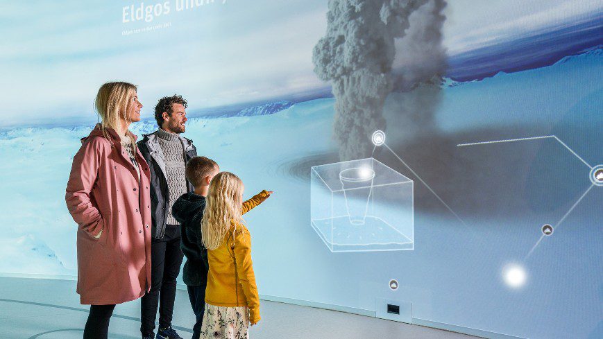 Family of four are taking a part of Wonders of Iceland exhibition