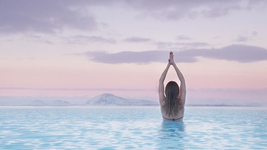 Girl enjoy myvatn natural hot springs in Iceland