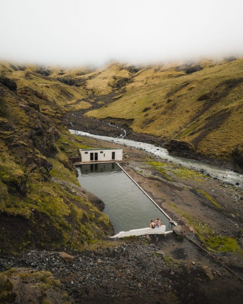 Swimming pool between mountains in Iceland