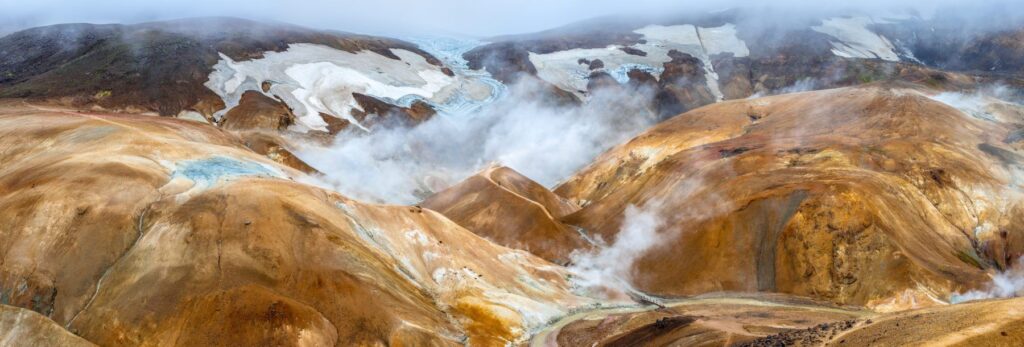 Kerlingarfjöll (The Ogress' Mountains), a volcanic mountain range situated in the highlands of Iceland. The shimmering red-orange color of the earth is because of the volcanic rhyolite stone the mountains are composed of.