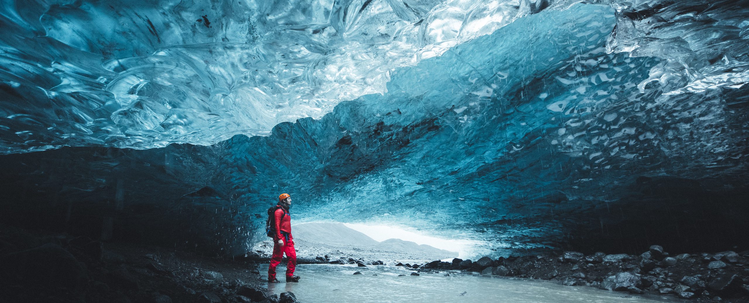 A man inside the ice cave