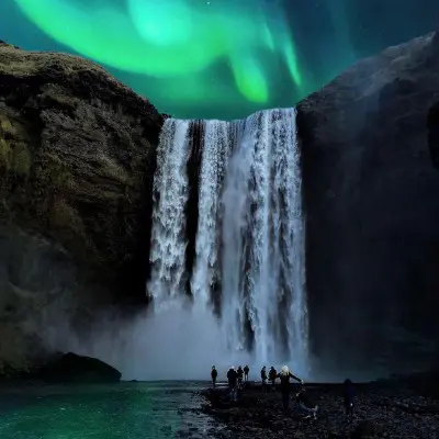 A huge waterfall and the northern lights