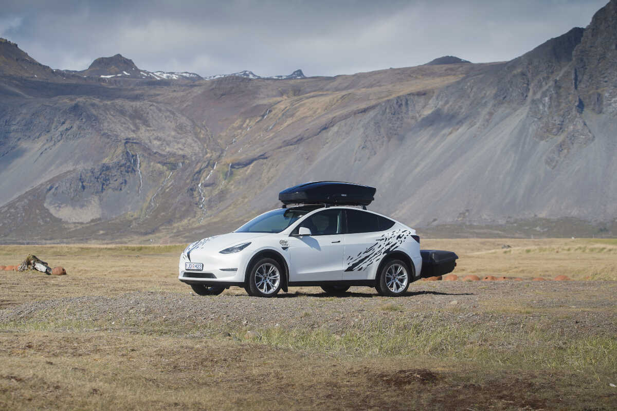 Tesla Campervan surrounded by Icelandic landscape
