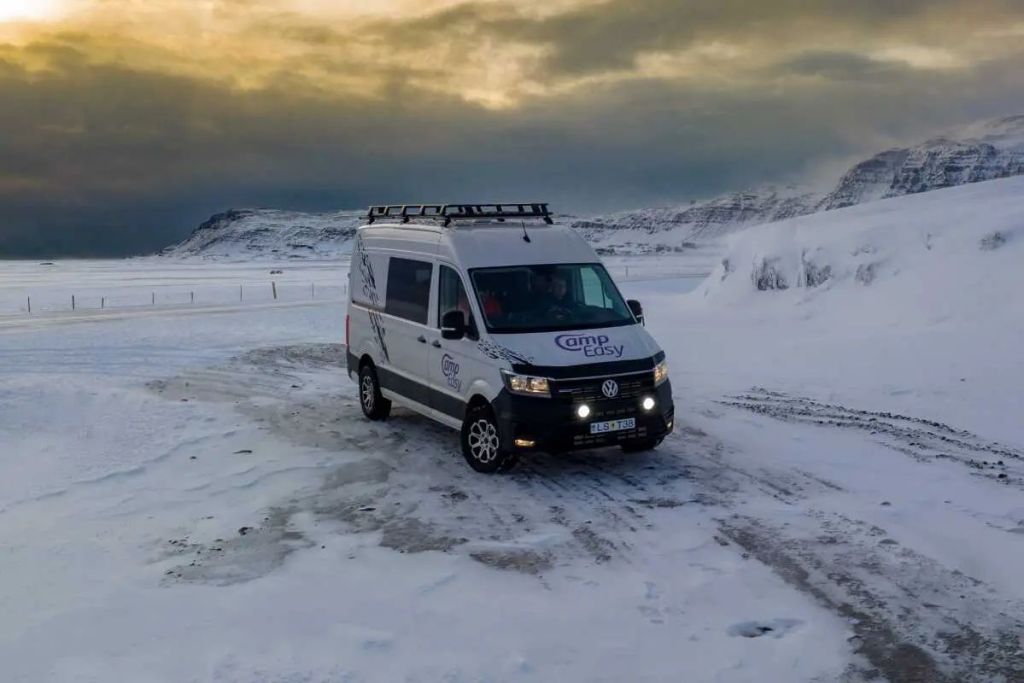 Camper van parked on snow