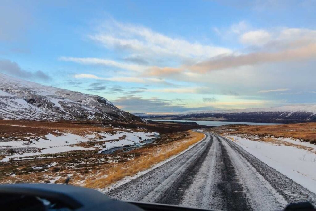 View from camper van front cabin on the road and mountains