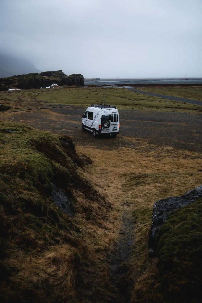 Parked campervan on the field