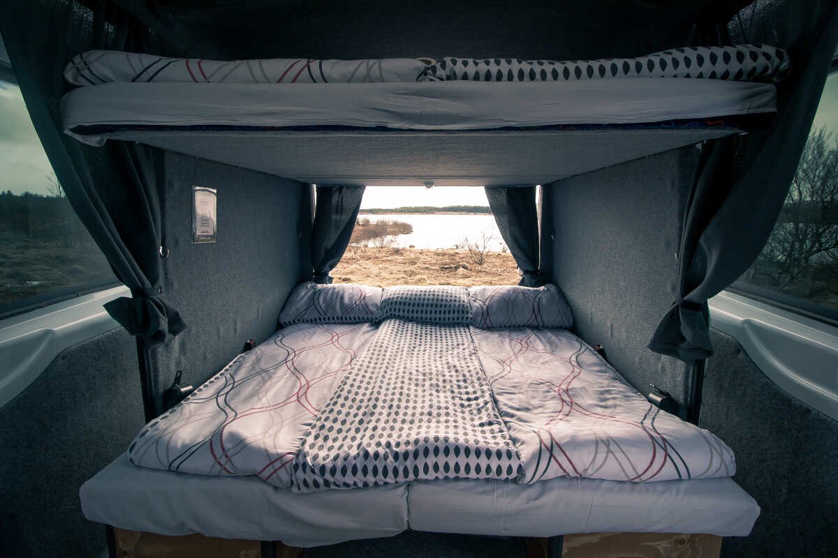 Interior view of the campervan with made beds