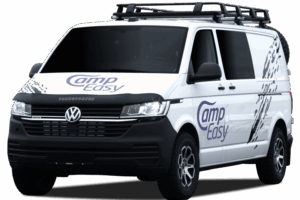 White Volkswagen campervan with CampEasy logo