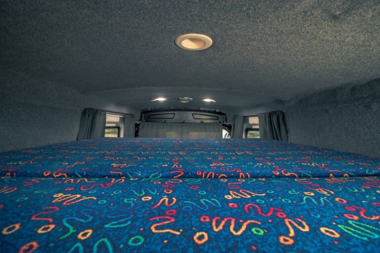 A view on upper bed inside the campervan.