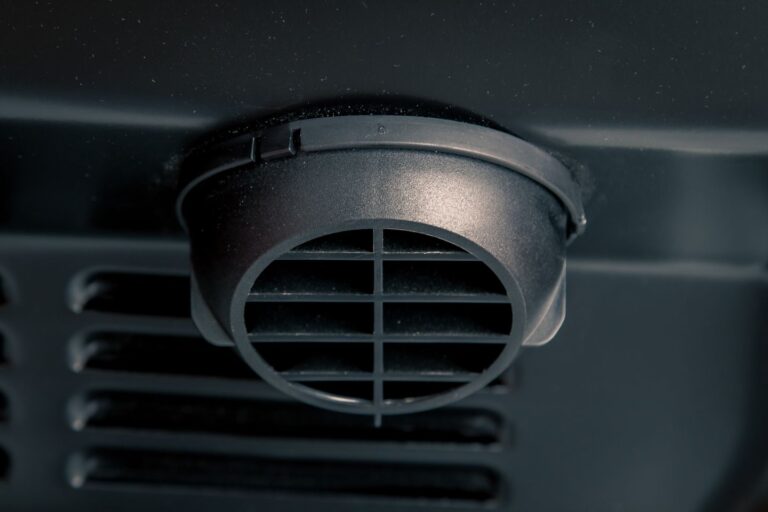 A black air supply inside the campervan.