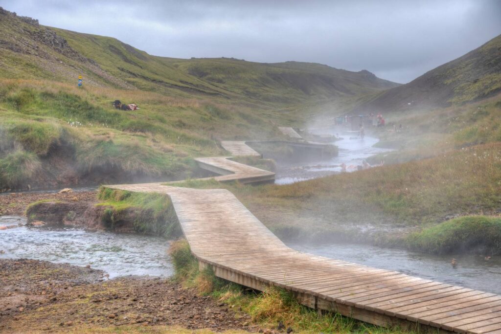 Hot springs at Reykjadalur valley in Iceland