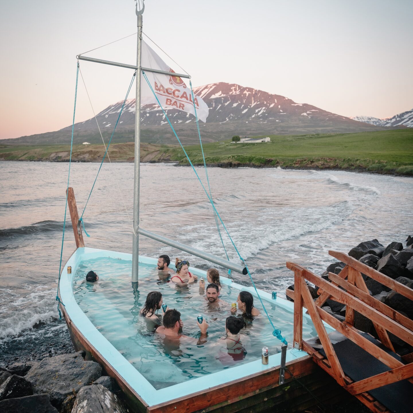 Group of people are inside the boat with geothermal water