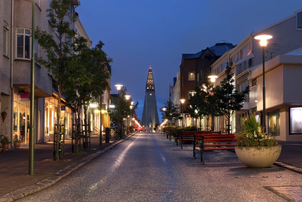 Night view of Skolavordustigur street leading to the Hallgrimskirkja Church, one of the landmarks of Reykjavik, the capital city of Iceland.