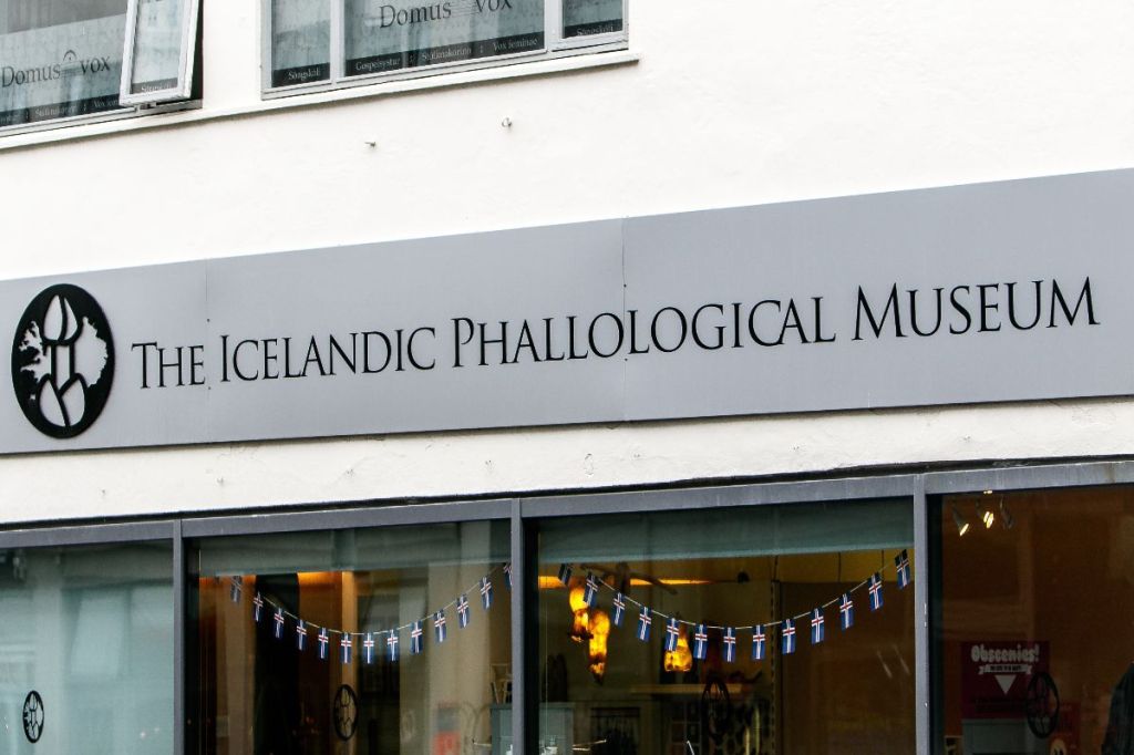 Front entrance of the Icelandic Phallological Museum with the museum sign above the windows.