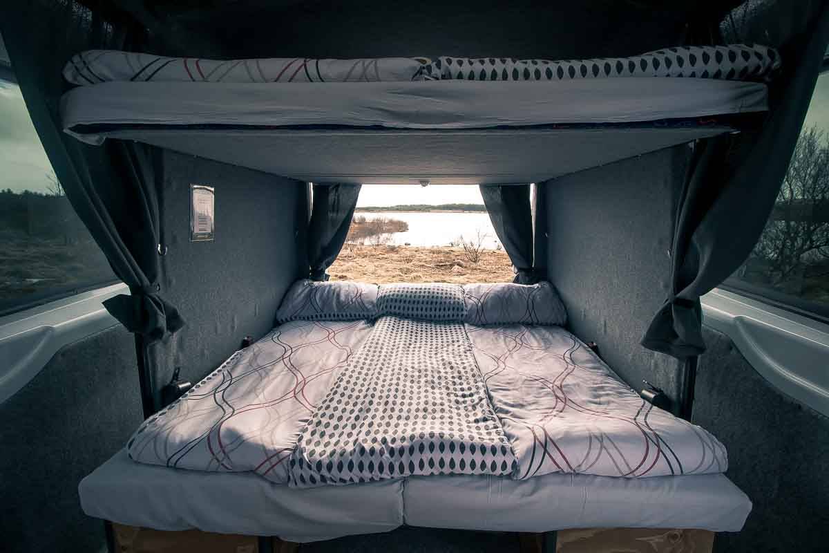 camper with bedding laid out