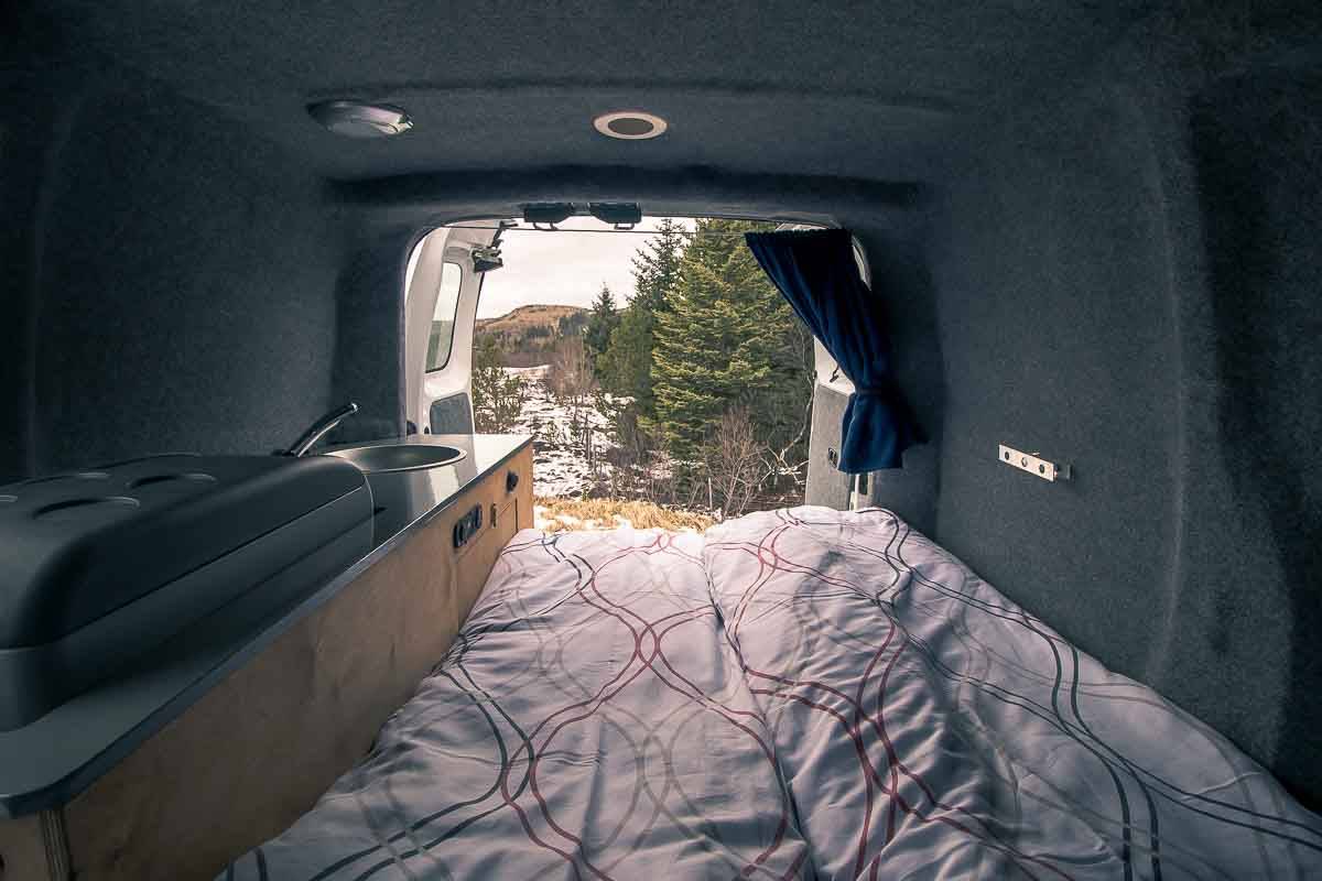 laid out bedding in a camper van