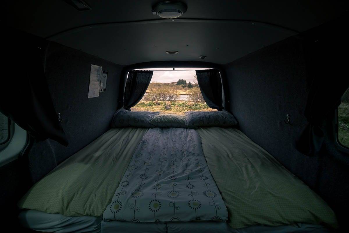 bedding laid out in a camper
